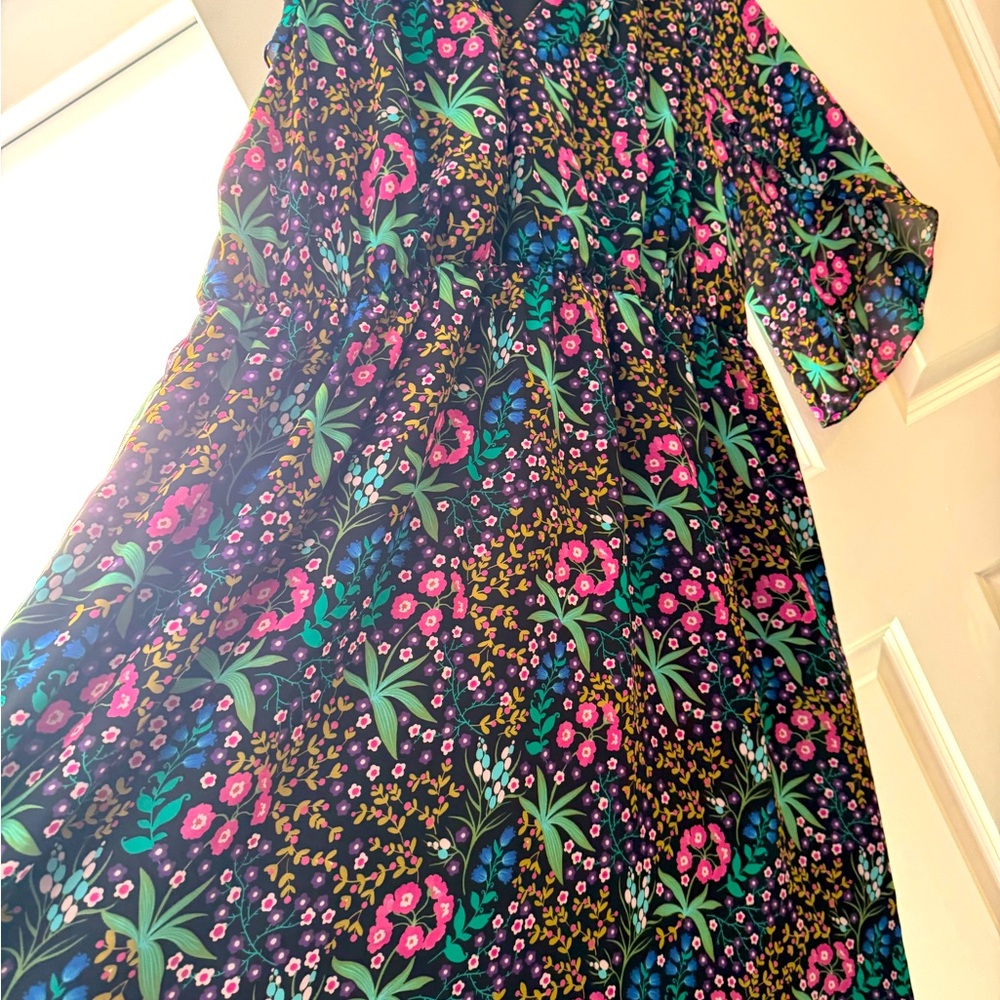 Gorgeous flowy sheer dress.